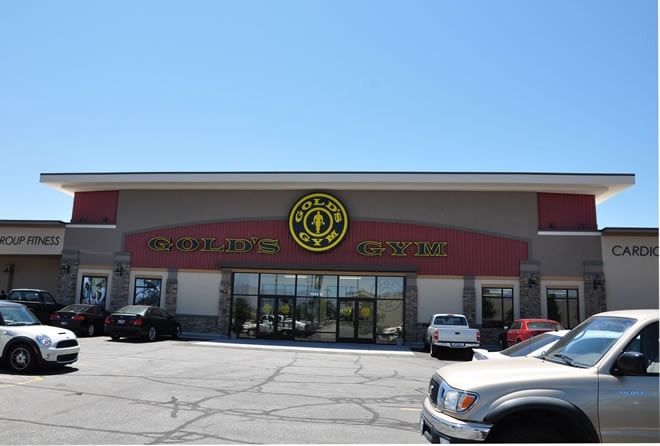 Gold's Gym storefront — commercial exterior drywall finish