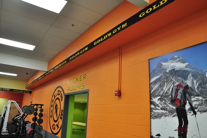 Gold's Gym interior locker room — drywall finish and paint