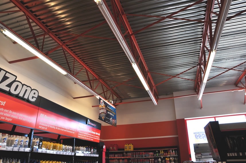 AutoZone interior — exposed ceiling framing and drywall finish