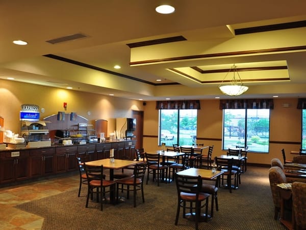 Hotel breakfast dining area — commercial drywall and ceiling finish