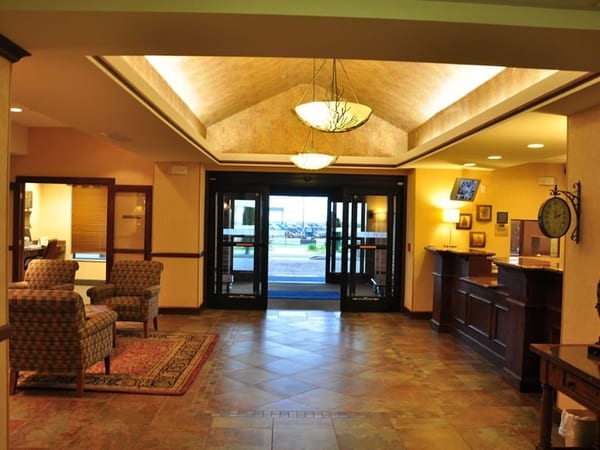 Hotel lobby with seating area — drywall, framing, and finish work